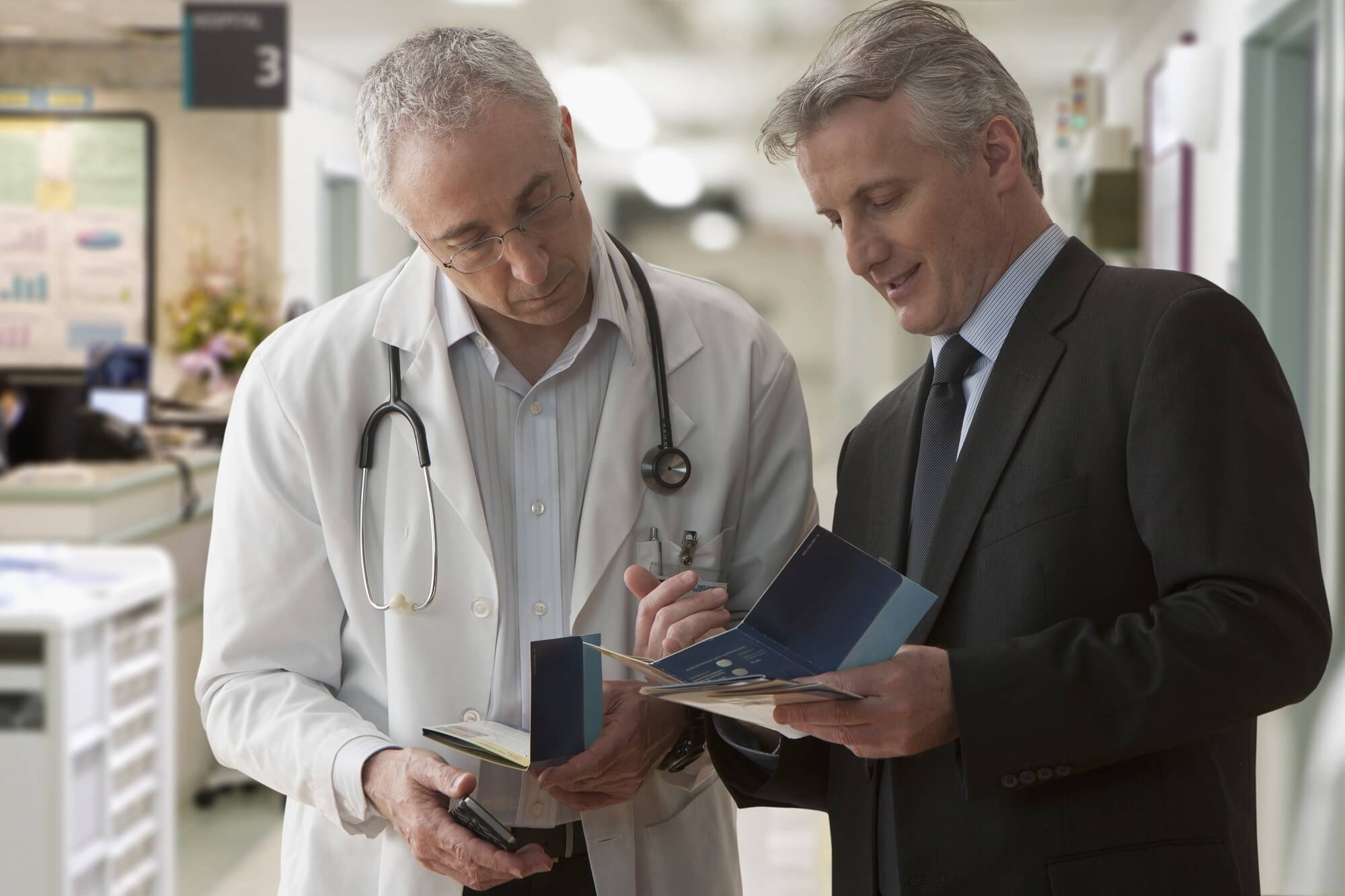 Healthcare professionals reviewing documentation